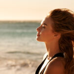 Shot of a beautiful young woman on the beach